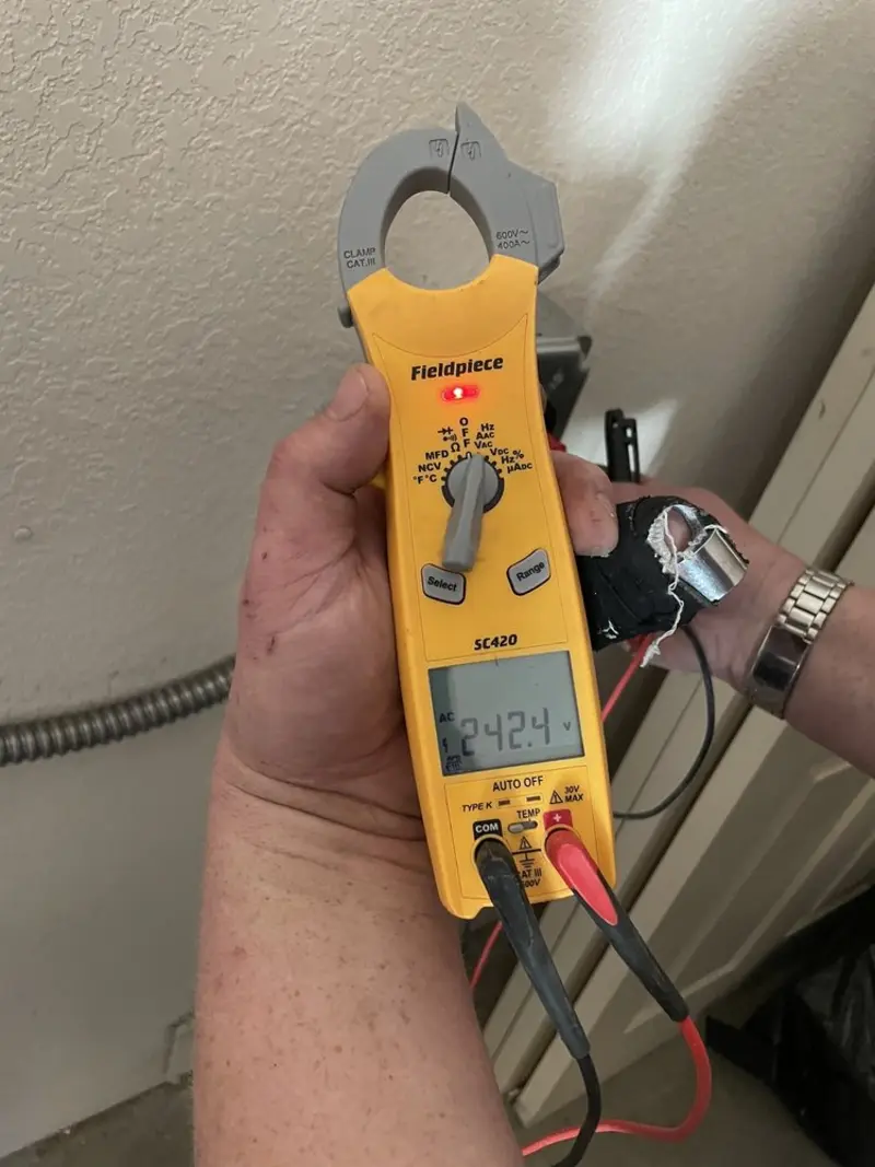 Voltage testing with clamp meter during Generator Installation in San Pablo